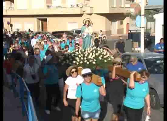 Imagen de La Virgen Rosario fue llevada en Romería al Parque Muncipal Lo Albentosa, donde pernoctó.